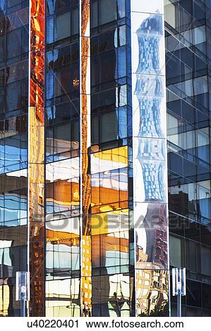 Stock Image - USA, New York, New York City, Glass facade of office building. Fotosearch