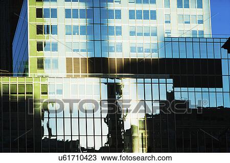 USA, New York, New York City, Glass facade of office building View Large Photo Image Stock Image - USA, New York, New York City, Glass facade of office building. Fotosearch