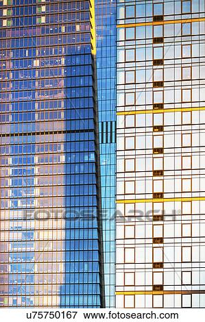 USA, New York, New York City, Glass facade of office building View Large Photo Image Stock Photo - USA, New York, New York City, Glass facade of office building. Fotosearch
