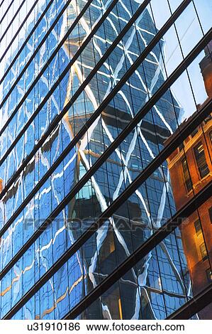 USA, New York, New York City, Glass facade of office building View Large Photo Image Stock Photograph - USA, New York, New York City, Glass facade of office building. Fotosearch