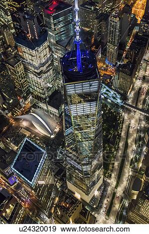 Stock Photo - USA, New York, New York City, Manhattan, Aerial view of illuminated World Trade Center at night. Fotosearch