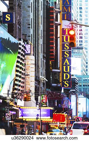 Picture - USA, New York, New York City, Times square, 42nd street, Neon lights and advertisements on street. Fotosearch