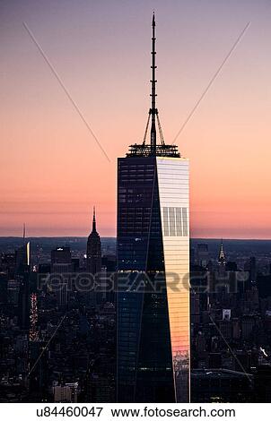 Stock Photo - USA, New York State, New York City, One World Trade Center building at sunrise. Fotosearch