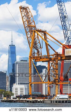 USA, New York State, New York City, Manhattan, Commercial dock against city skyline View Large Photo Image Stock Image - USA, New York State, New York City, Manhattan, Commercial dock against city skyline. Fotosearch