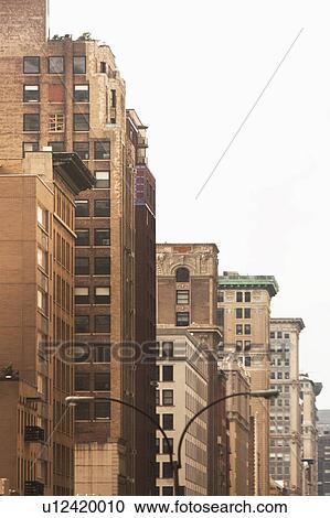 USA, New York State, New York City, Skyscrapers along street View Large Photo Image Stock Image - USA, New York State, New York City, Skyscrapers along street. Fotosearch