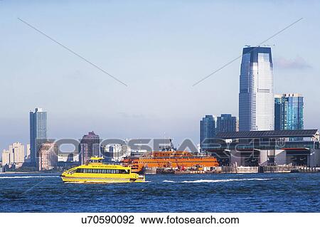 USA, New York State, New York City, Skyscrapers with yellow ship in foreground View Large Photo Image Stock Image - USA, New York State, New York City, Skyscrapers with yellow ship in foreground. Fotosearch