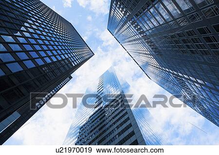 Stock Photo - USA, New York State, New York City, Manhattan, Skyscrapers seen from below. Fotosearch