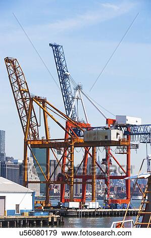 USA, New York State, New York City, Container cranes in commercial dock View Large Photo Image Stock Photo - USA, New York State, New York City, Container cranes in commercial dock. Fotosearch