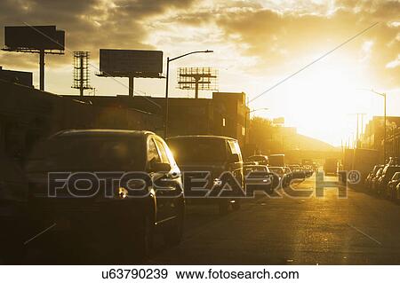 USA, New York State, New York City, Manhattan, Car traffic at sunset View Large Photo Image Stock Photo - USA, New York State, New York City, Manhattan, Car traffic at sunset. Fotosearch