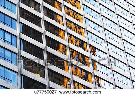 Stock Photo - USA, New York State, New York City, Manhattan, Facade of office building. Fotosearch