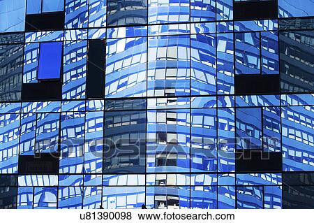 Stock Photo - USA, New York State, New York City, Glass facade of skyscraper. Fotosearch