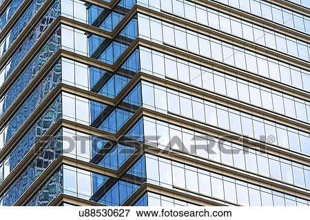 Stock Photo - USA, New York State, New York City, Manhattan, Facade of office building. Fotosearch