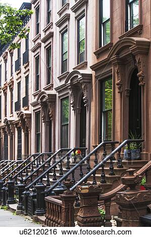 Stock Photograph - USA, New York State, New York City, Brooklyn, Facades and entrances of townhouses. Fotosearch