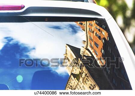 USA, New York State, New York City, Townhouses reflecting in car rear window View Large Photo Image Stock Photograph - USA, New York State, New York City, Townhouses reflecting in car rear window. Fotosearch