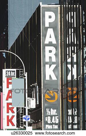 USA, New York State, New York City, Signs at entrance to parking garage View Large Photo Image Stock Photography - USA, New York State, New York City, Signs at entrance to parking garage. Fotosearch