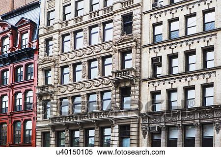 Stock Photography - USA, New York State, New York City, Facades in city street. Fotosearch