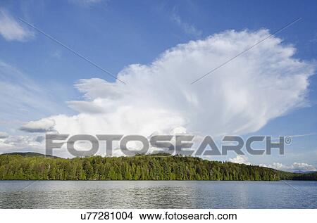 Picture - USA, New York State, New York, Lake Placid, Cumulus cloud. Fotosearch