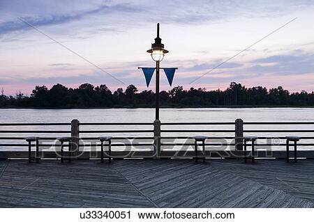 USA, North Carolina, Wilmington, Riverbank at sunset View Large Photo Image Stock Image - USA, North Carolina, Wilmington, Riverbank at sunset. Fotosearch