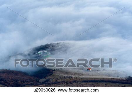 View of dispersing mountain mist from Luchistoye Village, South Demergi mountain, Crimea, Ukraine View Large Photo Image Stock Photograph - View of dispersing mountain mist from Luchistoye Village, South Demergi mountain, Crimea, Ukraine. Fotosearch