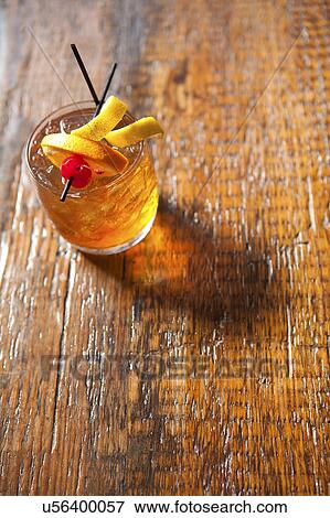 Whiskey cocktail in glass View Large Photo Image Stock Photo - Whiskey cocktail in glass. Fotosearch