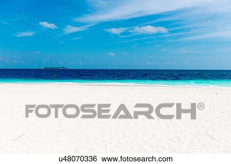 Stock Photograph - White sand beach, Maldives. Fotosearch