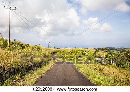 Stock Photo - Winding rural road, Tanglad, Nusa Penida, Indonesia. Fotosearch