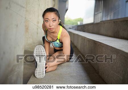 Woman doing splits on steps View Large Photo Image Stock Image - Woman doing splits on steps. Fotosearch