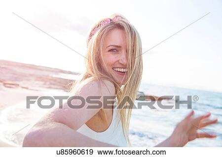 Woman enjoying beach View Large Photo Image Stock Photo - Woman enjoying beach. Fotosearch