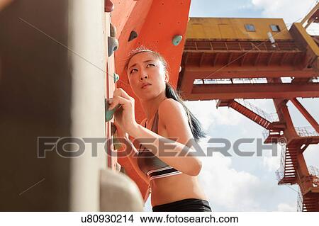 Woman on climbing wall View Large Photo Image Picture - Woman on climbing wall. Fotosearch