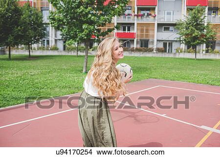 Woman playing basketball View Large Photo Image Picture - Woman playing basketball. Fotosearch
