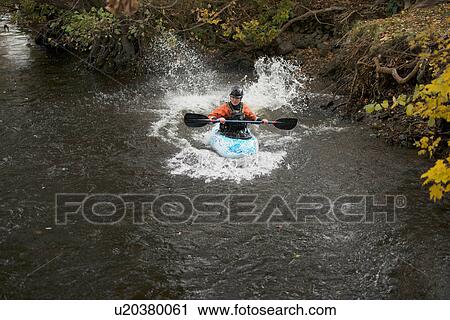 Young female kayaker paddling river Dee, Llangollen, North Wales View Large Photo Image Stock Image - Young female kayaker paddling river Dee, Llangollen, North Wales. Fotosearch