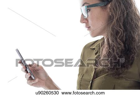 Young woman using smart phone View Large Photo Image Stock Image - Young woman using smart phone. Fotosearch