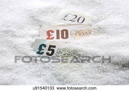 Stock Image - Banknotes in sugar. Fotosearch