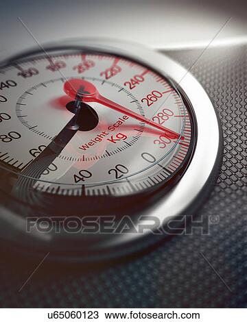 Stock Image - Broken weighing scales. Fotosearch