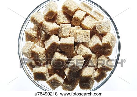 Brown sugar cubes in bowl View Large Photo Image Stock Photo - Brown sugar cubes in bowl. Fotosearch
