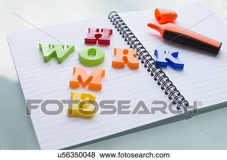 Colourful letters on notebook spelling homework View Large Photo Image Stock Photo - Colourful letters on notebook spelling homework. Fotosearch