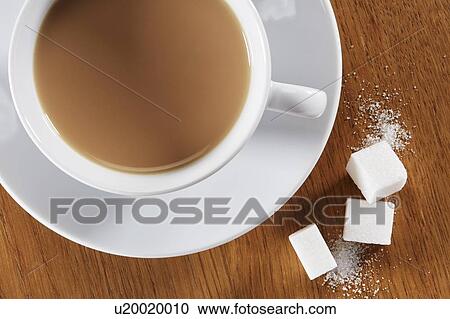 Cup of tea with sugar lumps View Large Photo Image Stock Image - Cup of tea with sugar lumps. Fotosearch