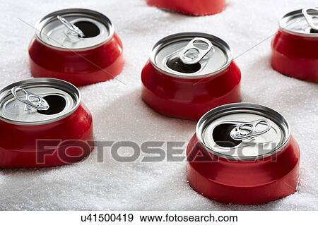 Stock Photo - Drinks cans in sugar. Fotosearch