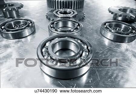 Stock Image - Gears and clogs. Fotosearch