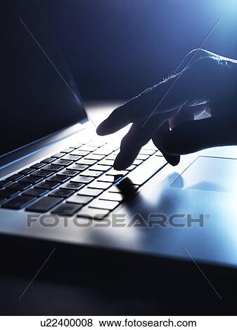Stock Photo - Laptop computer use. Fotosearch