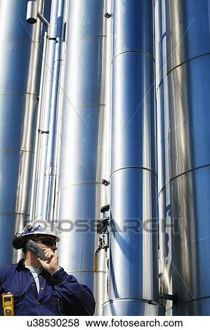 Oil and gas workers View Large Photo Image Stock Photo - Oil and gas workers. Fotosearch
