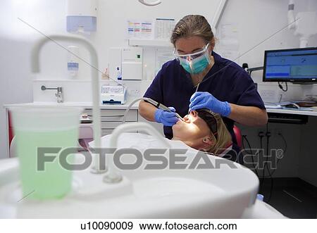 Patient at dentist's View Large Photo Image Stock Photo - Patient at dentist's. Fotosearch
