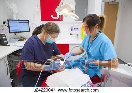 Patient at dentist's View Large Photo Image Stock Photo - Patient at dentist's. Fotosearch