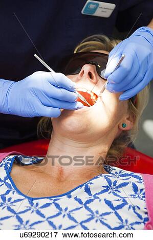 Patient at dentist's View Large Photo Image Stock Photo - Patient at dentist's. Fotosearch