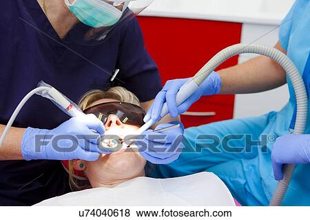 Stock Photo - Patient at dentist's. Fotosearch