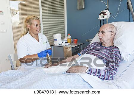 Patient with female nurse View Large Photo Image Stock Image - Patient with female nurse. Fotosearch