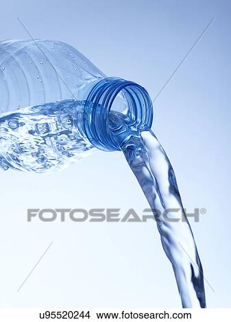 Picture - Pouring water from bottle. Fotosearch