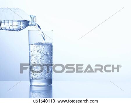 Pouring water in glass View Large Photo Image Stock Image - Pouring water in glass. Fotosearch