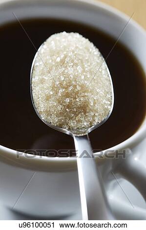 Spoonful of sugar and hot drink View Large Photo Image Stock Image - Spoonful of sugar and hot drink. Fotosearch