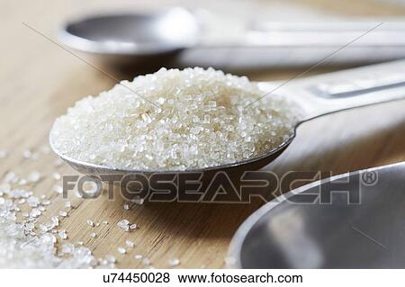 Stock Photo - Spoonful of sugar. Fotosearch